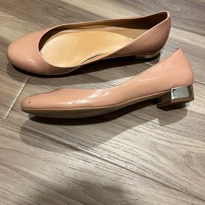 Nude patent flats
